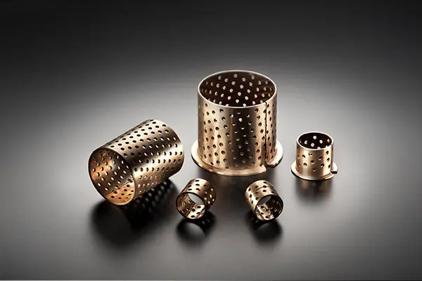 WRAPPED BRONZE BEARINGS WITH THROUGH HOLES FOR LUBRICATING